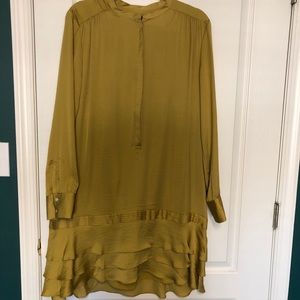 Ruffle Dress. 100% polyester inner & outer layer.